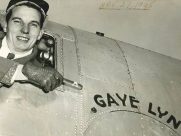 Saunie Gravely, in DC-3 cockpit, points cigar at aircraft named GAYE LYN, after his daughter.