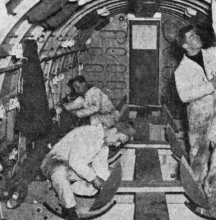 Three unknown VAE staff apply tech skill and self-confidence to DC-3 interior conversion. If you recognize these men, CALL ME! Photo published: NY World-Telegram, 5/6/194